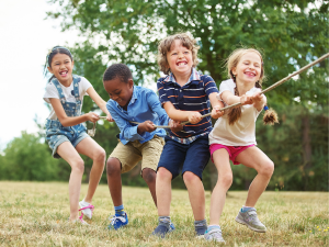 Unique outdoor activities for kids: kids playing with friends in obstacle course outside