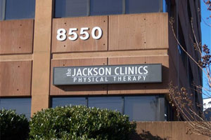 sign on side of clinic that reads The Jackson Clinics Physical Therapy