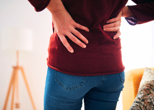 woman struggling with hip pain, needs physical therapy