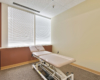 private room with physical therapy table
