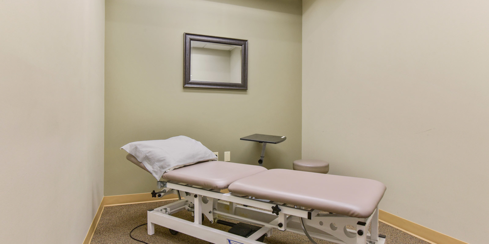 physical therapy table in private room