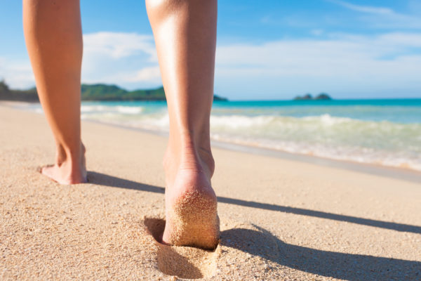 Walking barefoot on sand